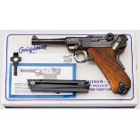 Parabellum Mauser Mod. 06/73, im Karton Kal. 9 mm Luger, Nr. 11.014943. Nummerngleich. Blanker Lauf,