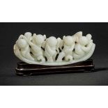 A White Jade Brushrest with ‘Five Boys’ Motif, Mid-Qing Dynasty 清中期白玉雕 “五子登科”筆架 Width 15.7 cm,