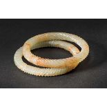 A Pair of Fine Carved Bangles, Han Dynasty 漢代絞絲紋玉手鐲 （圓口一對） External diameter 7.6 cm, inner