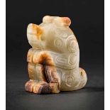 A Carved Jade Bear Incised with Scrolls, Western Zhou Dynasty 西周勾雲龍紋玉雕熊 Width 5.8 cm, height 6.5 cm.