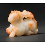 A Celadon Jade with ‘Monkey and Horse’ Motif, Qing Dynasty 清代白玉雕 “馬上封侯” Width 9.1 cm, height 6.4 cm.