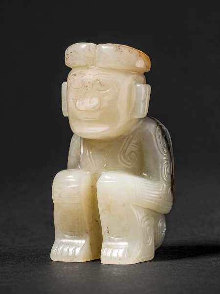 A Carved Jade figure of a Crouching Man with Horns, Western Zhou Dynasty 西周玉雕牛角神人蹲像 Width 3.8 cm,