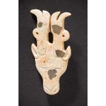 A Carved Jade ‘Deer Head’ Pendant, Late Shang Dynasty 商晚期玉雕鹿首佩 Width 4.6 cm, height 9.2 cm. 寬 4.6
