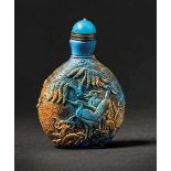 A Turquoise Snuff Bottle with ‘Magpie on Plumtree’ Motif, Mid-Qing Dynasty 清中期綠松石喜鵲登梅鼻煙壺 Width 6.8