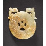 A Chukuo Jade Bi-disc with ‘Double Phoenixes’ Design, Western Zhou Dynasty 西周雙鳳紋出廓玉璧 Diameter 6.9