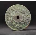 A Celadon Jade Bi-disc with Dancing Figures, Eastern Han Dynasty 東漢樂舞人青玉璧 Hetian celadon jade,