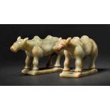 A Pair of Carved Jade Donkeys, Tang or Song Dynasty 唐或宋玉雕驢 （一對） A pair of Hetian jade donkeys with