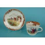 Cycling: a porcelain cup and saucer printed in brown and decorated in colours with cycling scenes,