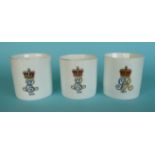 A pair of continental porcelain mugs with lithophane bases depicting Edward VII and Alexandra with a