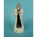 John Wesley: a Staffordshire pottery figure depicted standing, named in gilt, circa 1860, 172mm (