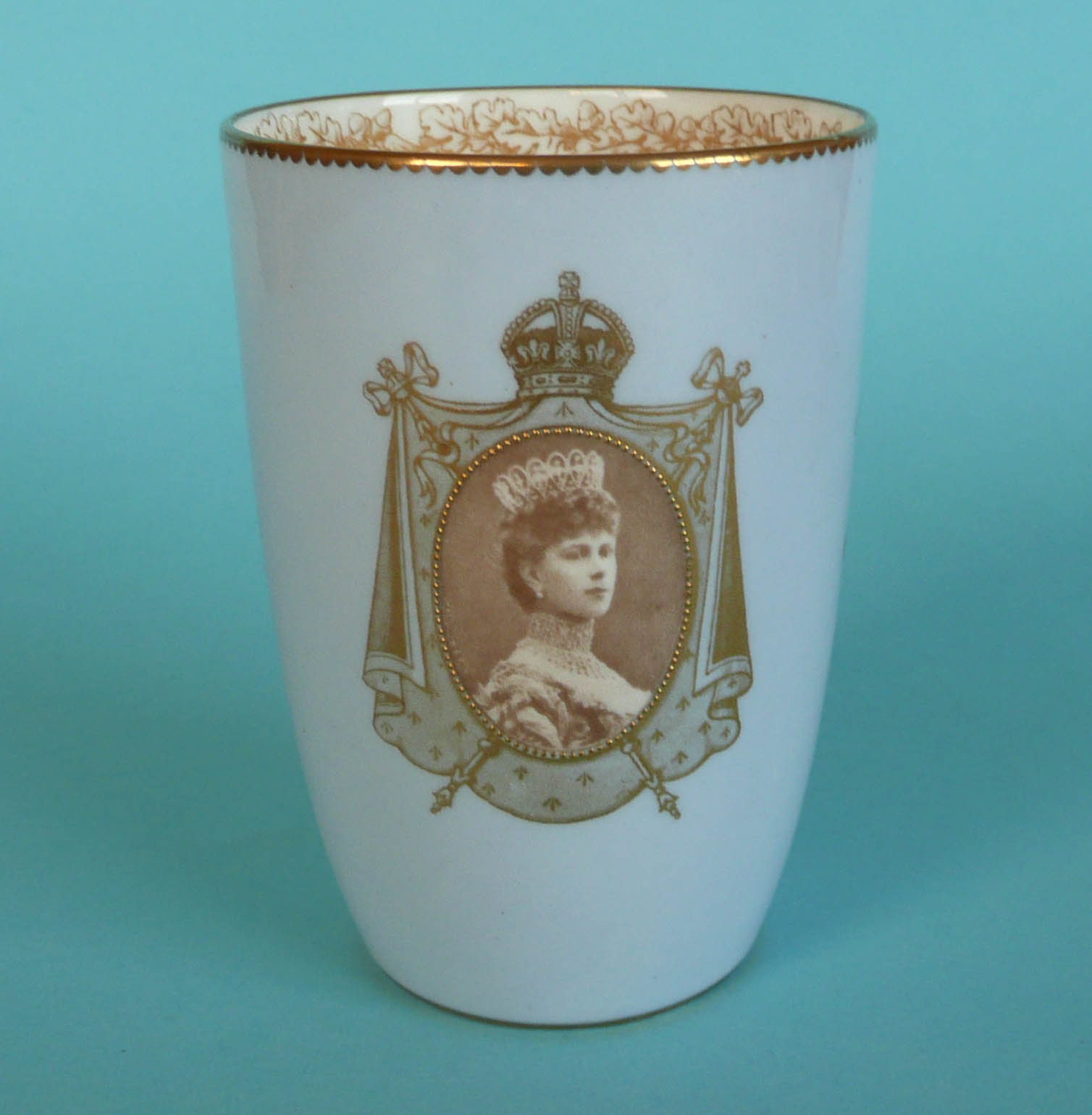1911 Coronation: a small pale blue ground curved sided beaker by Royal Doulton (commemorative, - Image 2 of 2