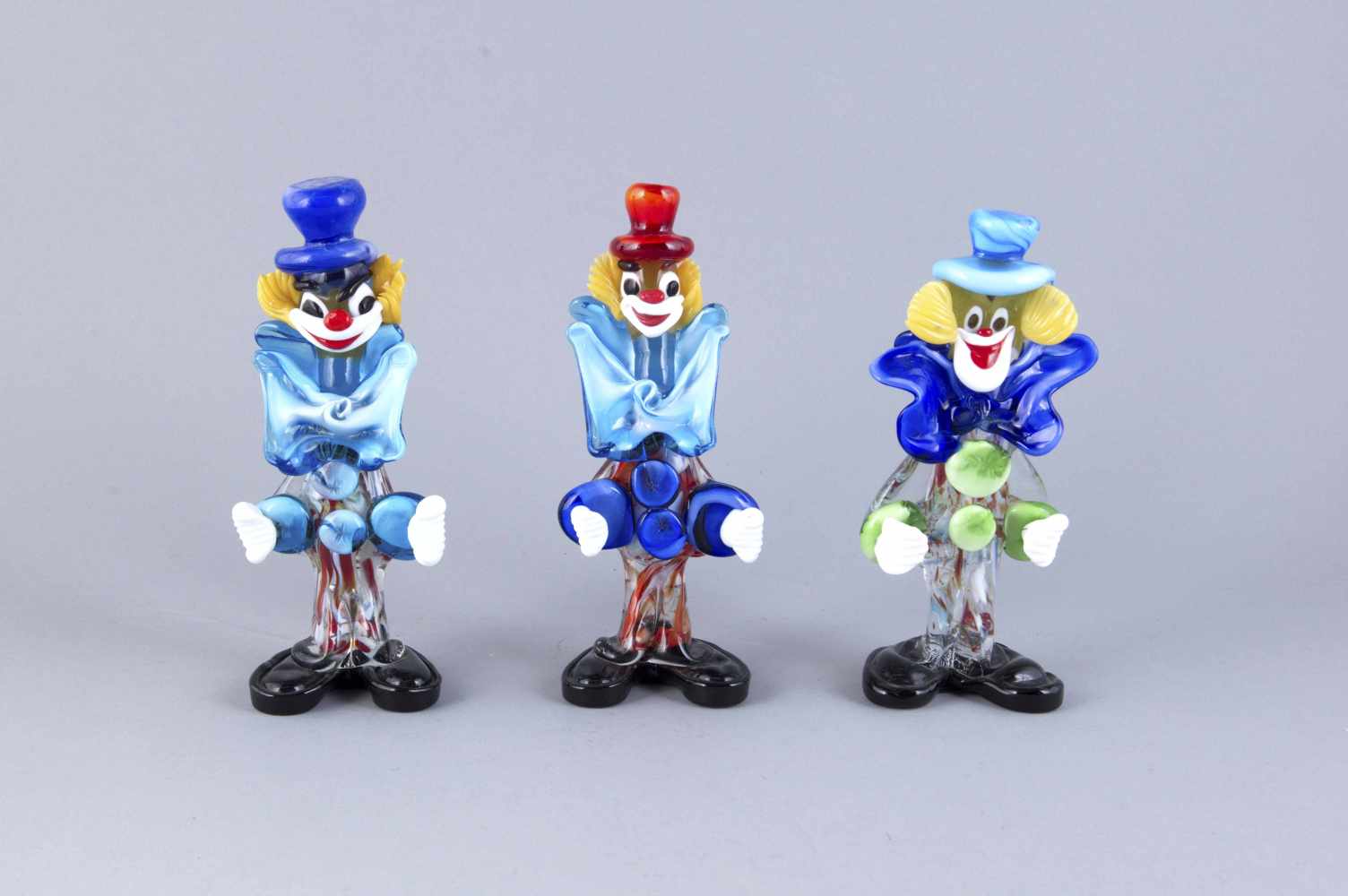 3 Figuren aus der Happy Clown Kollektion, Italien, 2. H. 20. Jh., Murano, farbloses und