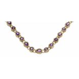 Amethyst-Collier GG 375/000 mit rund 4 mm und tropfenförmig 6 mm fac. Amethysten in guter Farbe, mit