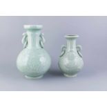 Zwei Vasen, China, 2. H. 20. Jh., Porzellan, lichte, jadefarbene Seladonglasur, bauchige Form,