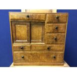 BURR WALNUT MINIATURE MULTI DRAWER COLLECTORS' CHEST WITH CENTRAL SLIDING DOOR