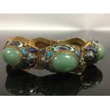 AN ORIENTAL JADE AND ENAMEL BRACELET MARKED SILVER