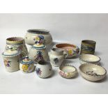 A COLLECTION OF 12 PIECES OF POOLE POTTERY, POTS,