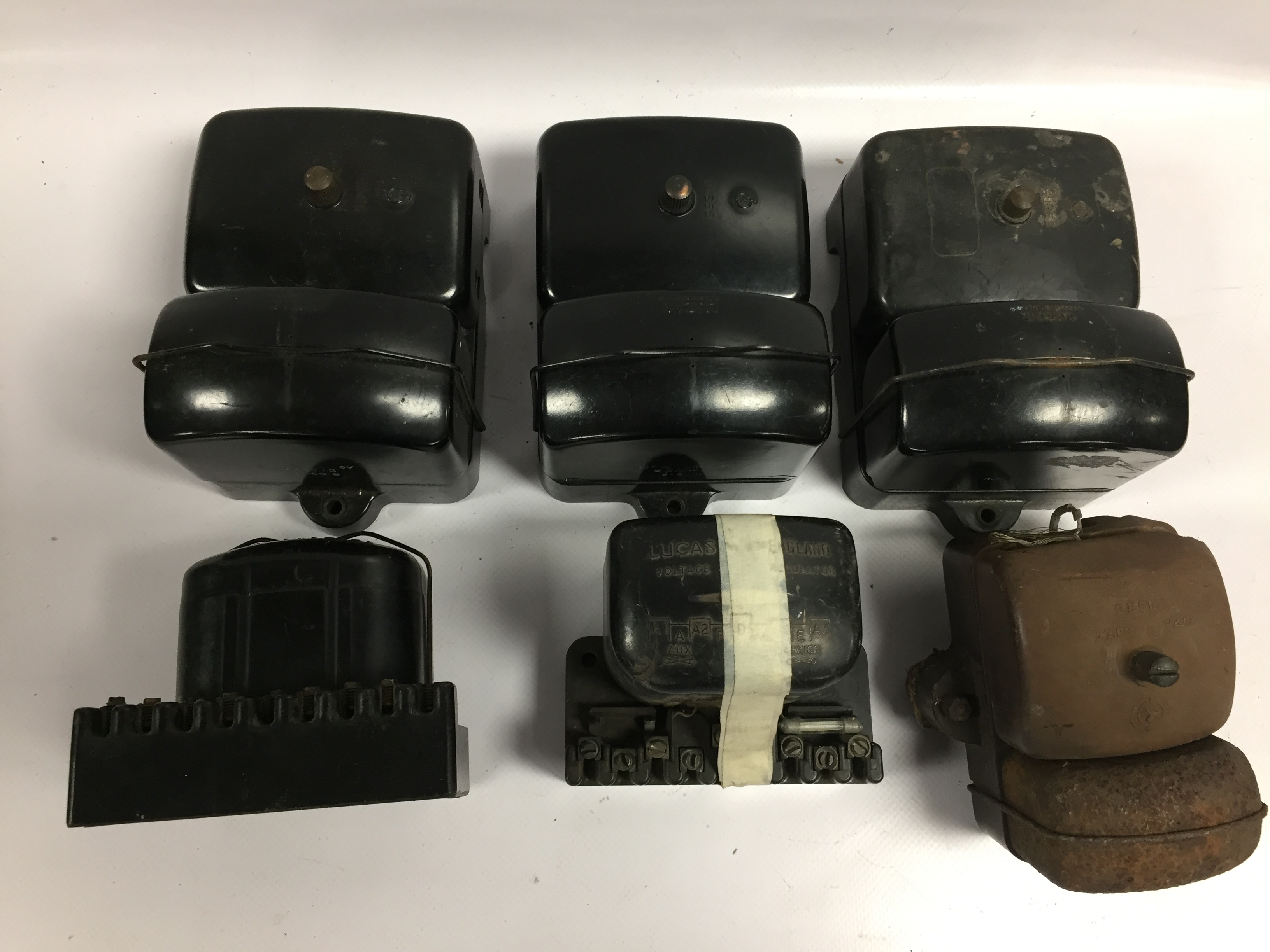 SIX VINTAGE CAR BAKELITE CASED FUSE BOXES