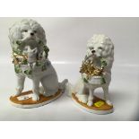 TWO STAFFORDSHIRE POODLES, 20 AND 16 CM,