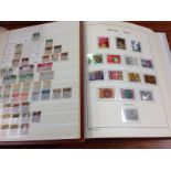 SWITZERLAND: A MAINLY USED COLLECTION IN TWO STOCKBOOKS AND LIGHTHOUSE 1945-85 ALBUM