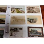 ALBUM WITH A COLLECTION OF PIERS POSTCARDS, INCLUDING WORTHING WRECK RP, SOUTHEND COURT SIZE,