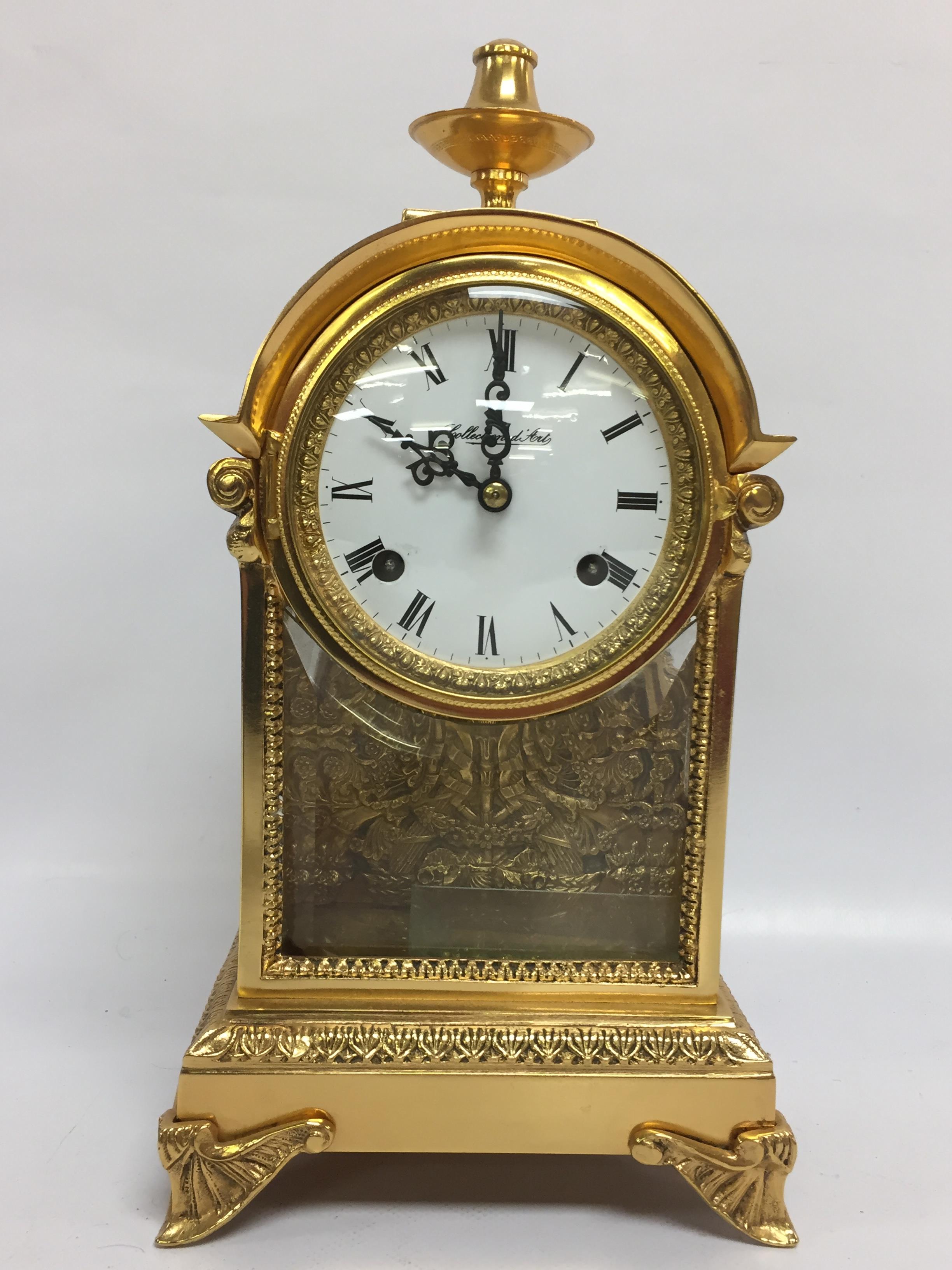 BRASS MANTLE CLOCK WITH GLASS FRONT AND SIDE PANELS,