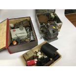 2 BOXES CONTAINING VINTAGE CINE AND MOVIE ACCESSORIES AND PARTS TO INCLUDE VARIOUS LENS, HOODS,