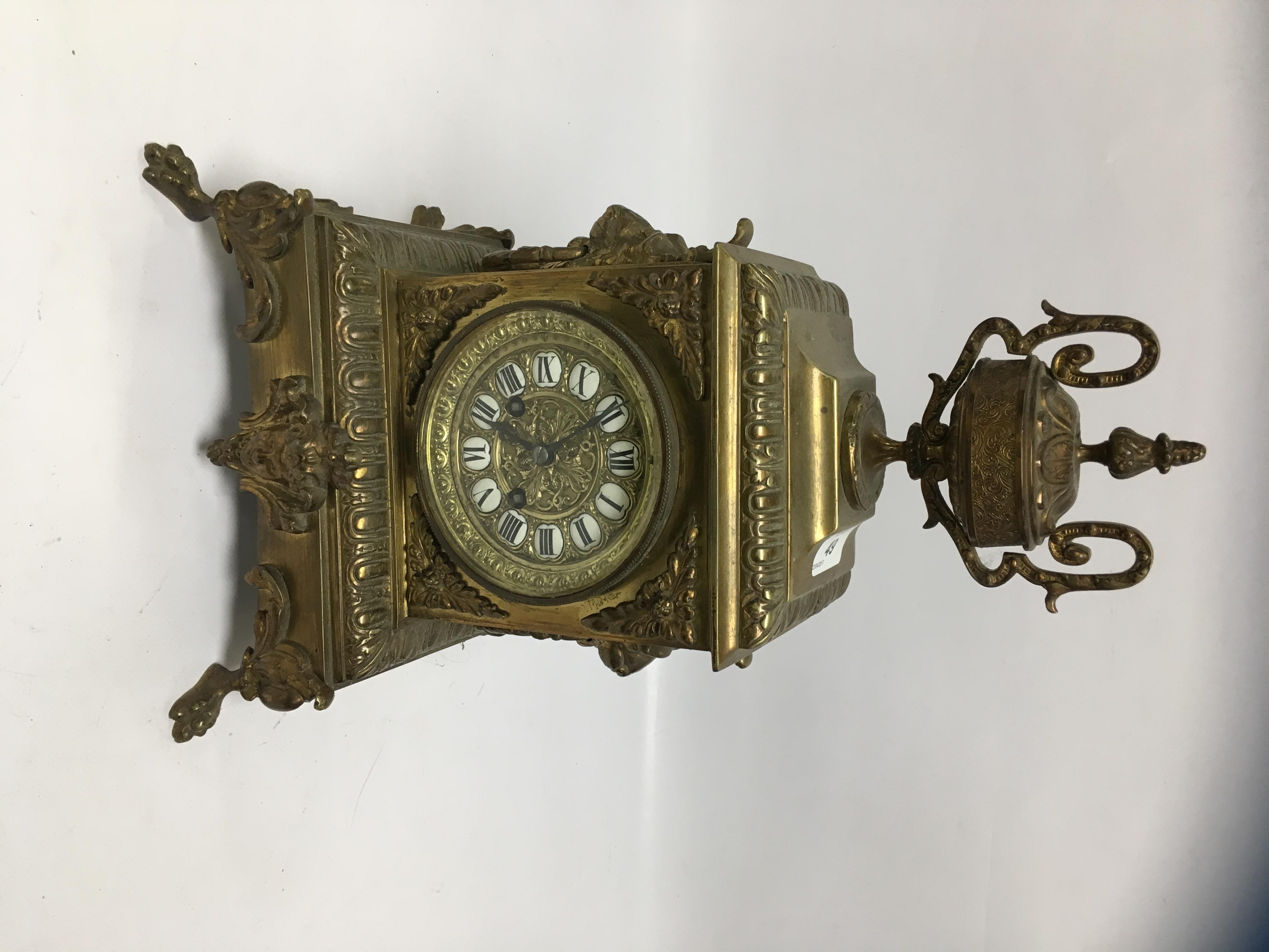 A C19TH GILT METAL MANTLE CLOCK,