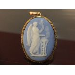 WEDGWOOD BLUE PORCELAIN CAMEO PENDANT IN A 9CT GOLD MOUNT (RUBBED MARKS)