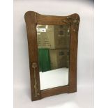 OAK FRAMED ARTS AND CRAFTS MIRROR WITH APPLIED COPPER TULIPS,