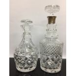 TWO CUT GLASS LEAD CRYSTAL DECANTERS ONE WITH SILVER COLLAR