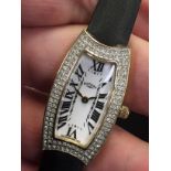 LADY'S ROTARY WRIST WATCH WITH QUARTZ MOVEMENT, YELLOW METAL CASE WITH ENCRUSTED BEZEL, WHITE DIAL,