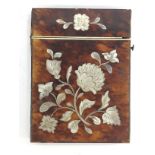 A VICTORIAN TORTOISESHELL AND MOTHER OF PEARL CARD CASE.