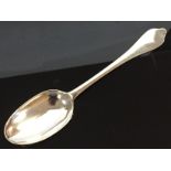 AN EARLY 18TH CENTURY TABLESPOON, RUBBED MARK, ENGRAVED WITH MONOGRAM, TRI,