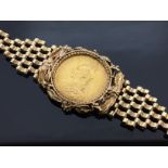 A VICTORIAN SOVEREIGN 1890 IN GOLD MOUNT ON GOLD BRACELET