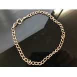 A 9CT GOLD WATCH CHAIN