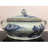 A CHINESE QUINLONG TWO HANDLED COVERED TUREEN AND A RELATED STAND,