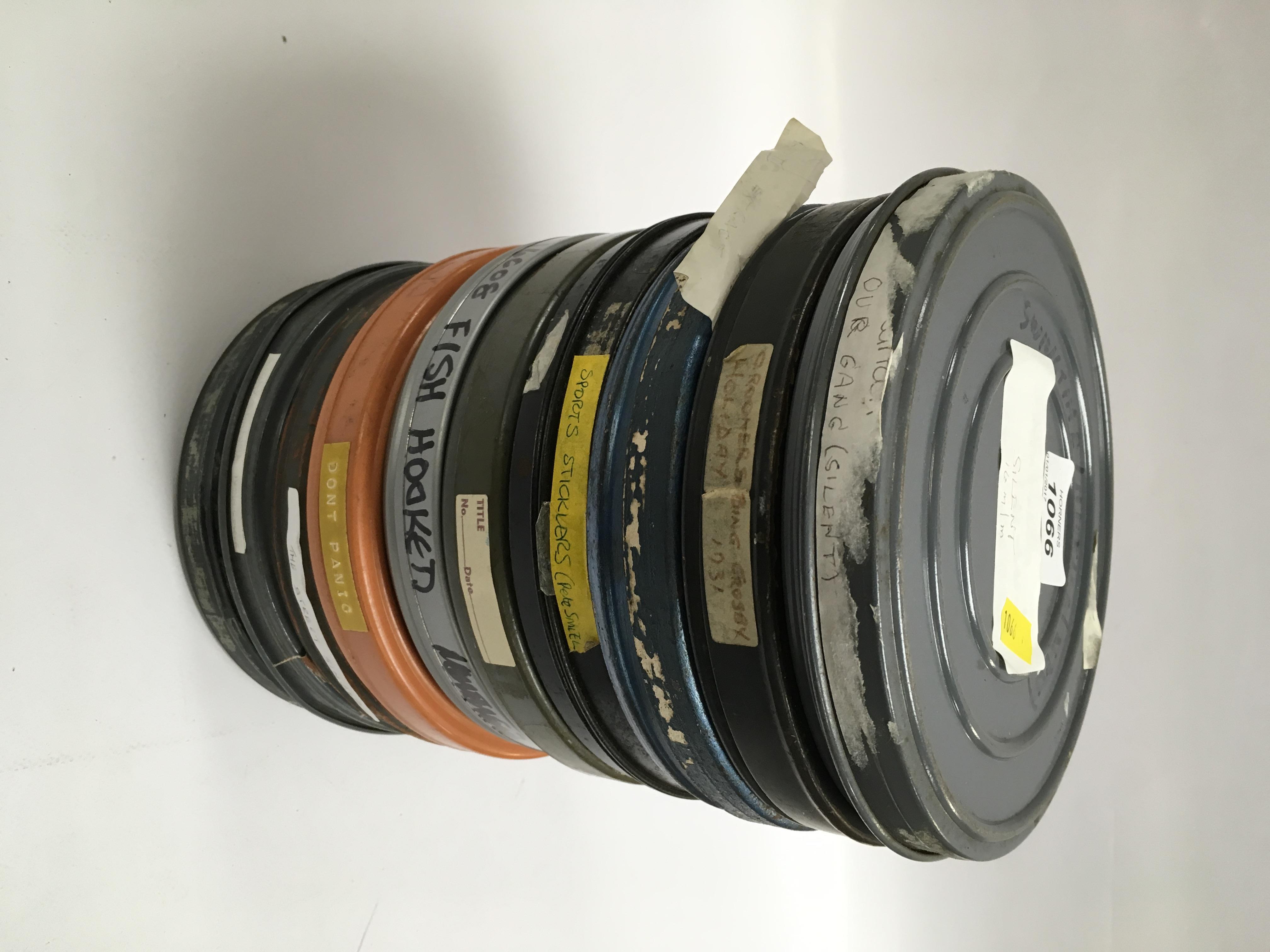 A COLLECTION OF 10 VINTAGE FILMS, IN CANS TO INCLUDE - THE JET CAGE, SYLVESTER AND TWEETY,
