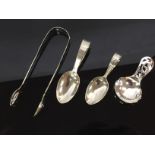 THREE SILVER CADDY SPOON AND PAIR OF SILVER SUGAR TONGS