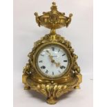 BRASS COLUMN CLOCK WITH URN PEDIMENT,