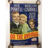 1940S COLOUR FILM POSTER 'ON THE AVENUE' 68 X 102CM (POOR CONDITION)