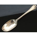 AN EARLY SILVER 18TH CENTURY TABLESPOON WITH RUBBED MARK,