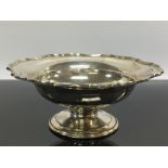 A SILVER BONBON DISH ON RAISED CIRCULAR FOOT,