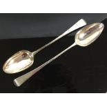 TWO SILVER BASTING SPOONS, ONE BY WILLIAM ELEY LONDON 1802 THE OTHER LONDON 1809,