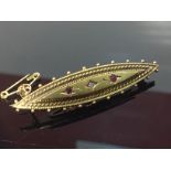 VICTORIAN 15CT GOLD MOURNING BAR BROOCH SET WITH A DIAMOND AND 2 RUBIES , GLAZED BACK.