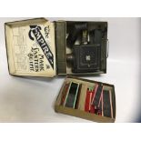 VINTAGE MAGIC LANTERN IN ORIGINAL BOX TOGETHER WITH VARIOUS GLASS SLIDES