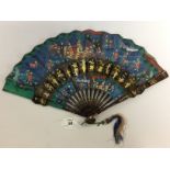 A C19TH CANTONESE BLACK AND GOLD LACQUERED FAN ,