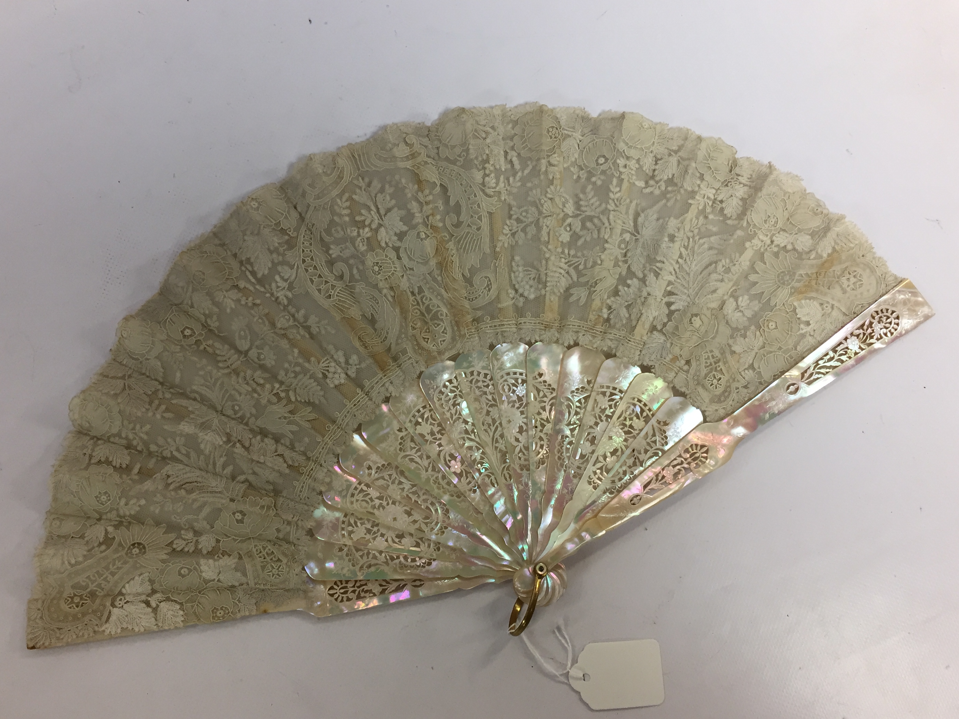 A C19TH FRENCH MOTHER OF PEARL AND SATIN FAN WITH LACE , PRESENTED IN CARDBOARD BOX,