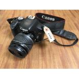 A CANON EOS 500D CAMERA BODY WITH CANON EFJ 18-55 MM LENS SOLD AS SEEN