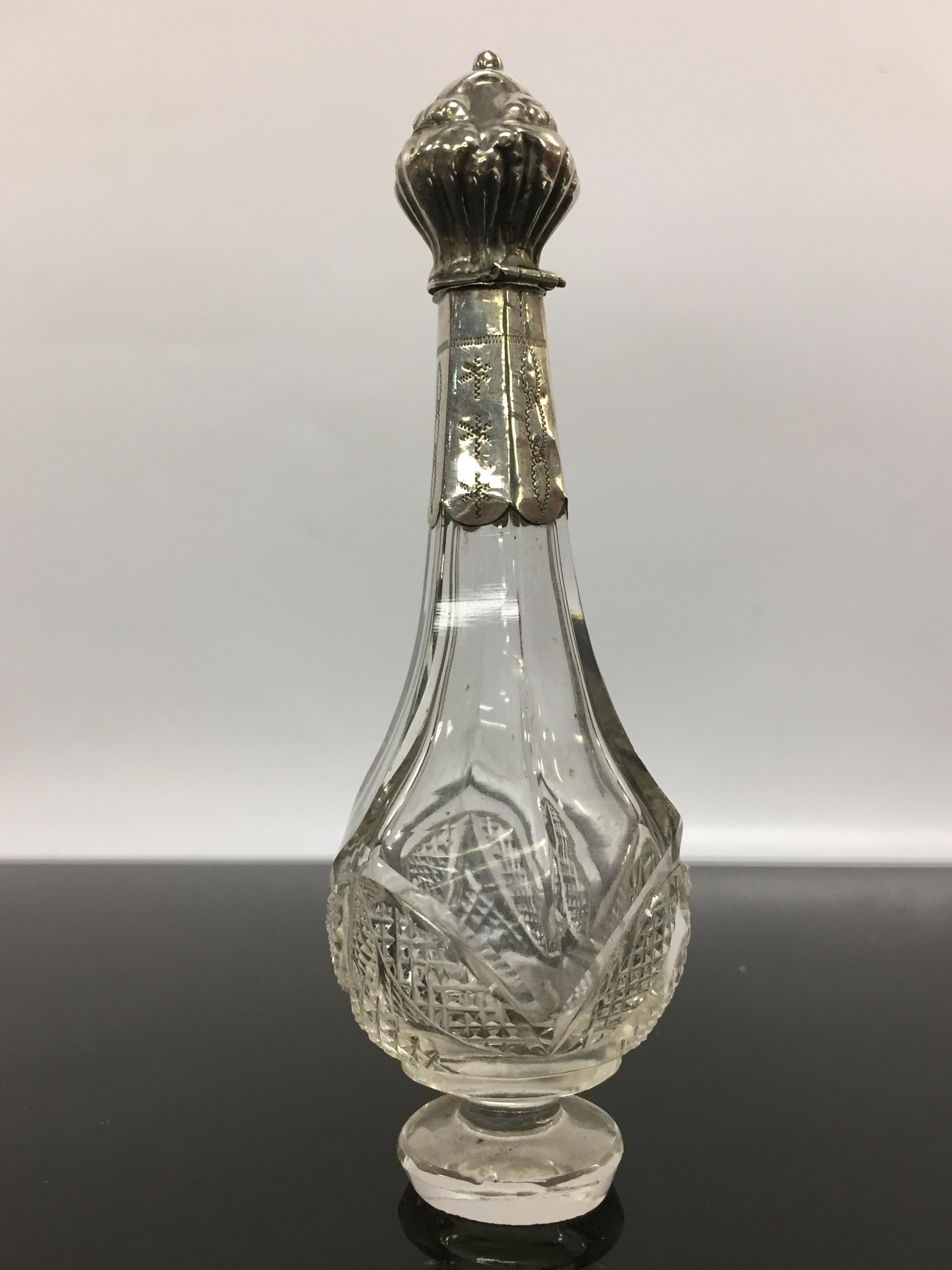 A SILVER AND GLASS SCENT BOTTLE WITH HINGED SILVER STOPPER AND SLEEVE, RUBBED HALLMARKS, - Image 2 of 3